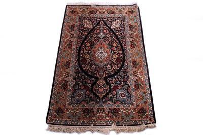 Lot 128 - A Sarouk style rug