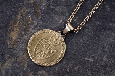 Lot 229 - A George III 1789 gold guinea, pendant on a 9ct gold necklace