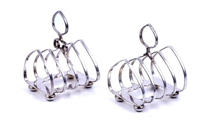 Lot 128 - Two similar small George V silver toast racks