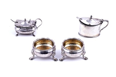 Lot 215 - A pair of George II circular salts; and two late silver mustard pots