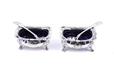 Lot 306 - A pair of George IV silver regimental salts; and a pair George III spoons