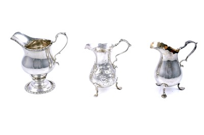 Lot 216 - A George V cream jug; and two others