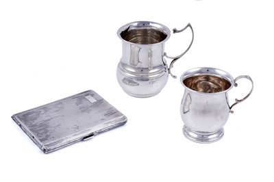 Lot 346 - A George VI silver cigarette case; and two small silver mugs