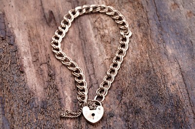 Lot 55 - A 9ct gold double curb-link bracelet