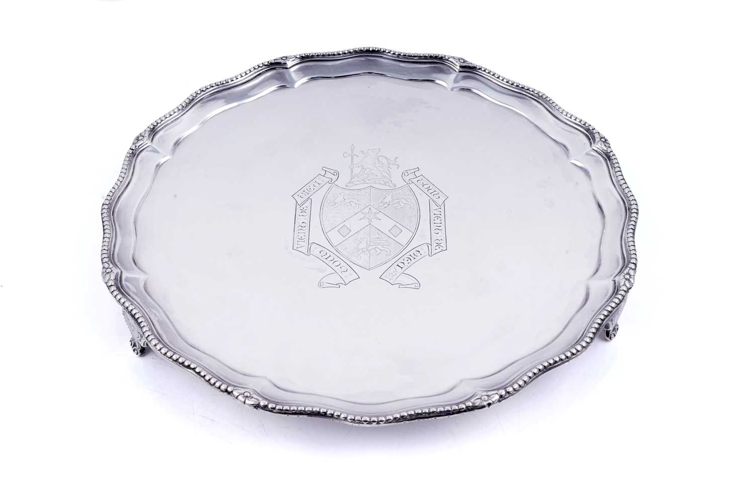 Lot 243 - A Victorian silver salver of shaped circular outline