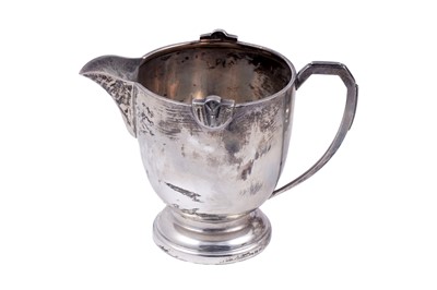 Lot 199 - A George V art deco three-piece silver teaset