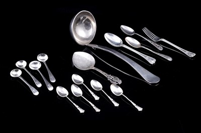 Lot 243 - A collection of silver and silverplate flatware and serving spoons
