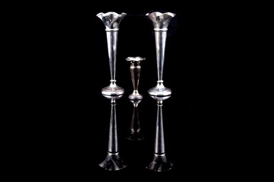 Lot 296 - George V silver trumpet vases; and a posy vase
