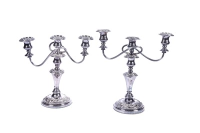 Lot 122 - A pair of silver plated three-branch candelabra