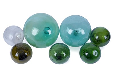 Lot 451 - A collection of seven blown glass floats