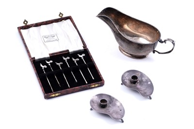 Lot 288 - Modern silver, comprising: Danish taper stick holders, cocktail sticks, and a sauce boat