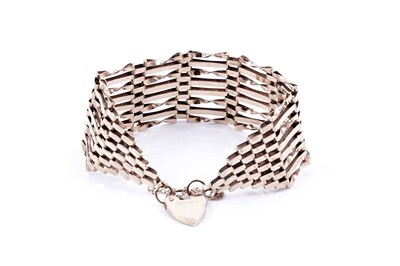 Lot 76 - A 1970s 9ct rose gold gate-link variant bracelet