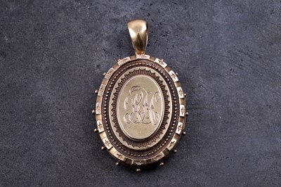 Lot 89 - A Victorian Etruscan Revival gold locket