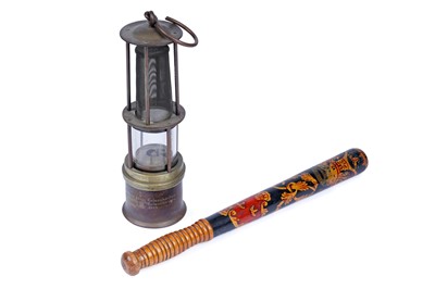 Lot 414 - A German four bar miners’ lamp; and a Victorian police truncheon