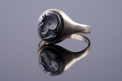 Lot 116 - A 1960s hematite signet ring depicting a Roman Centurian