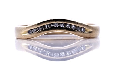 Lot 112 - A modern diamond half hoop eternity ring