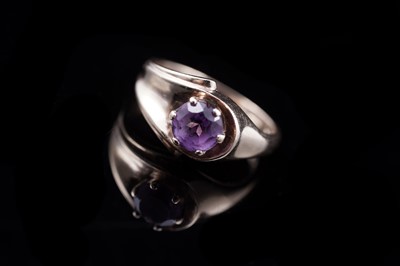 Lot 115 - A 1960s Art Nouveau revival amethyst ring
