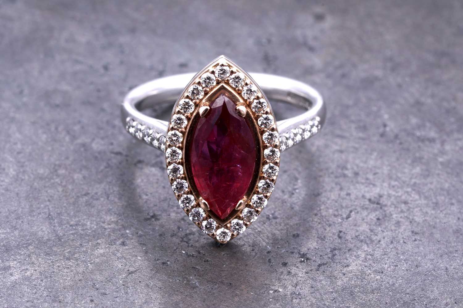 Lot 16 - A no heat ruby and diamond ring
