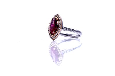 Lot 16 - A no heat ruby and diamond ring