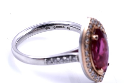 Lot 16 - A no heat ruby and diamond ring
