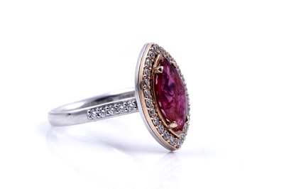 Lot 16 - A no heat ruby and diamond ring
