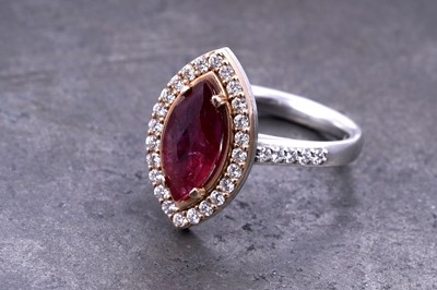 Lot 16 - A no heat ruby and diamond ring