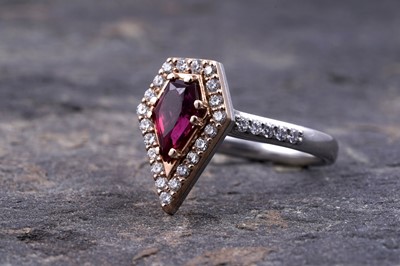 Lot 499 - A no-heat ruby and diamond ring
