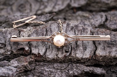 Lot 98 - An Edwardian Revival cultured pearl and diamond bar brooch
