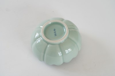Lot 345 - A Bowenite lily bowl; and a celadon lotus bowl