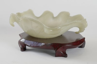 Lot 345 - A Bowenite lily bowl; and a celadon lotus bowl