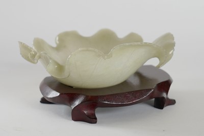 Lot 345 - A Bowenite lily bowl; and a celadon lotus bowl