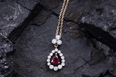Lot 166 - A contemporary ruby and diamond pendant necklace