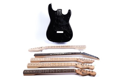 Lot 253 - Five guitar necks; and a Strat-style body