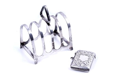 Lot 310 - An Edwardian silver vesta case; and a George V toast rack