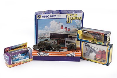 Lot 565 - A collection of boxed diecast vehicles