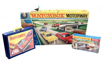 Lot 546 - A Matchbox carry case containing a selection of diecast cars; and other items