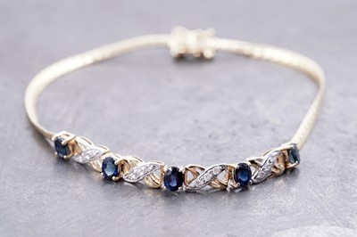 Lot 204 - A contemporary sapphire and diamond bracelet