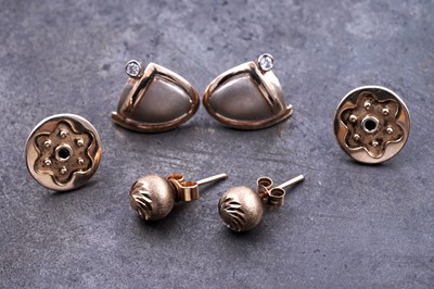 Lot 125 - Three pairs of modern gold stud earrings