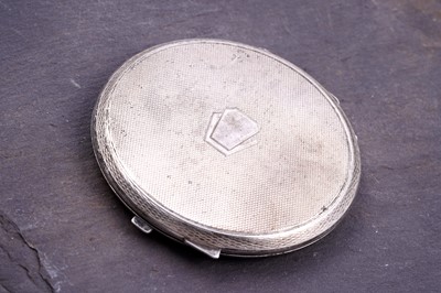 Lot 269 - A 1940s lady's Art Deco silver loose powder compact