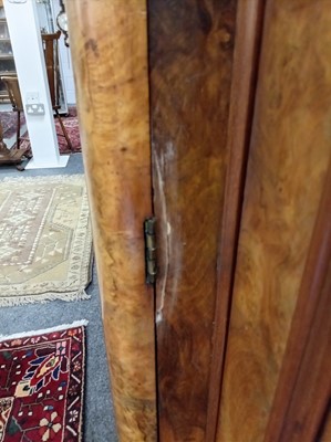 Lot 46 - A Victorian burr walnut breakfront triple wardrobe