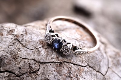 Lot 43 - A 1950s sapphire and diamond engagement ring