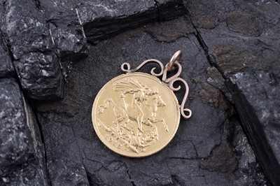 Lot 232 - A George V 1913 gold sovereign, in a pendant mount