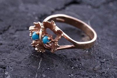 Lot 20 - An Egyptian 18ct gold flower pattern dress ring