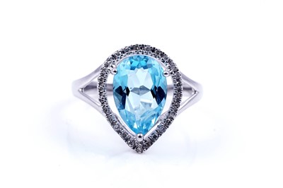 Lot 142 - A contemporary Swiss blue topaz and diamond ring