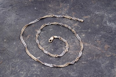 Lot 154 - A 14ct white and yellow fancy helix pattern necklace