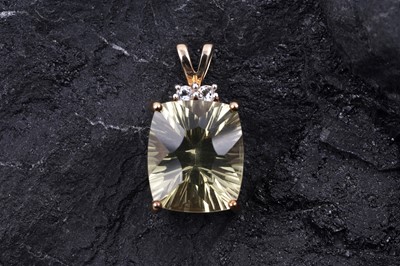 Lot 159 - A contemporary lemon citrine fancy radiant cut pendant