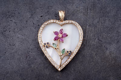 Lot 161 - A contemporary ruby, sapphire, emerald, and diamond love heart pendant