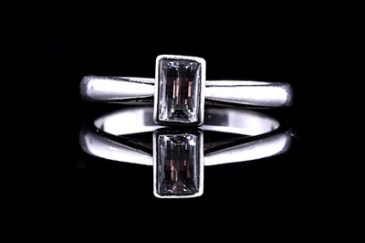Lot 102 - A contemporary Millenium-cut diamond single stone ring