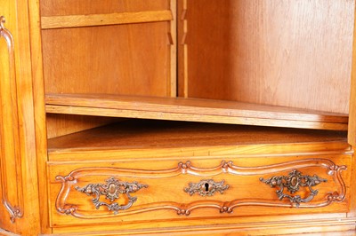 Lot 96 - A 19th-century style French fruitwood floor-standing corner cabinet