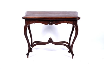 Lot 24 - A late 19th Century continental walnut games table